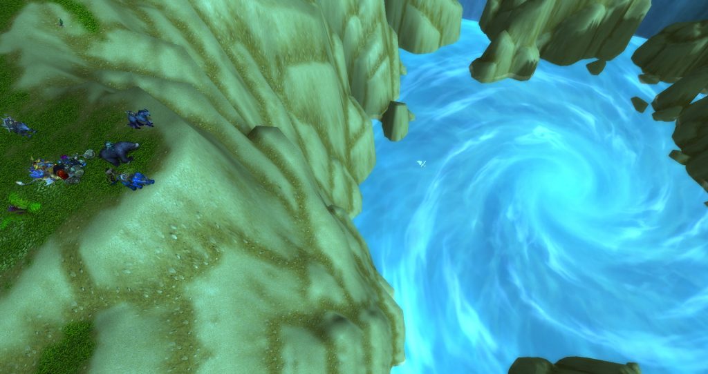 Da Doctas Tour looks down the giant sinkhole of Stranglethorn. One of them flies far below